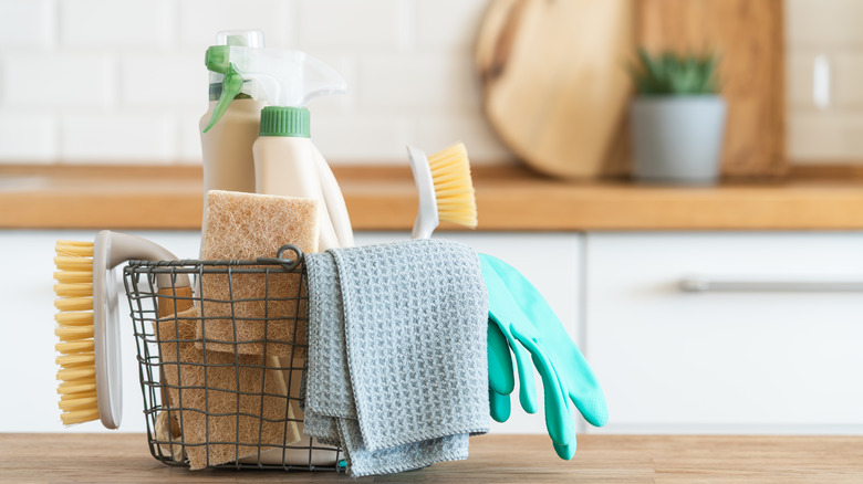 Basket of green cleaning supplies 