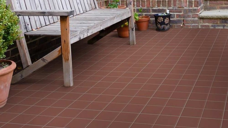 Quarry tiles installed in outdoor patio.
