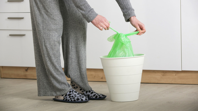 Emptying trash can