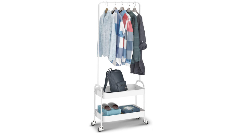 white rolling cart with clothes