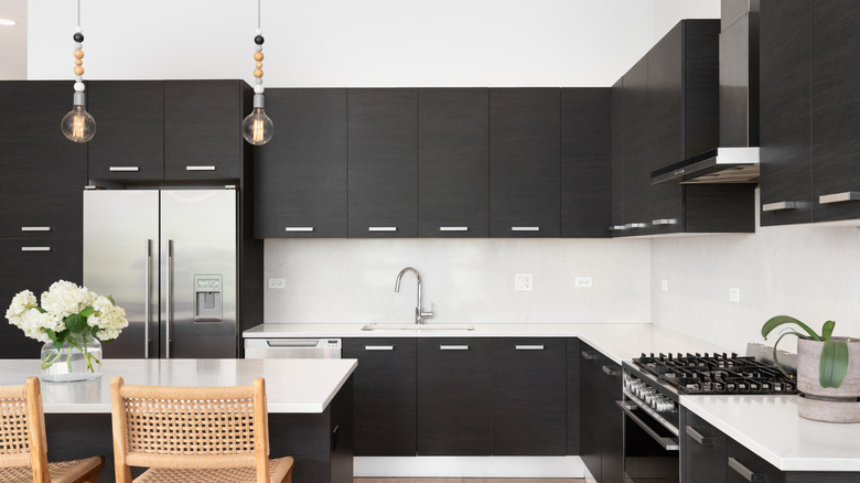 Kitchen with dark wood cabinets