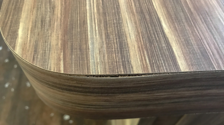 Formica countertop fake woodgrain coming apart at the seams