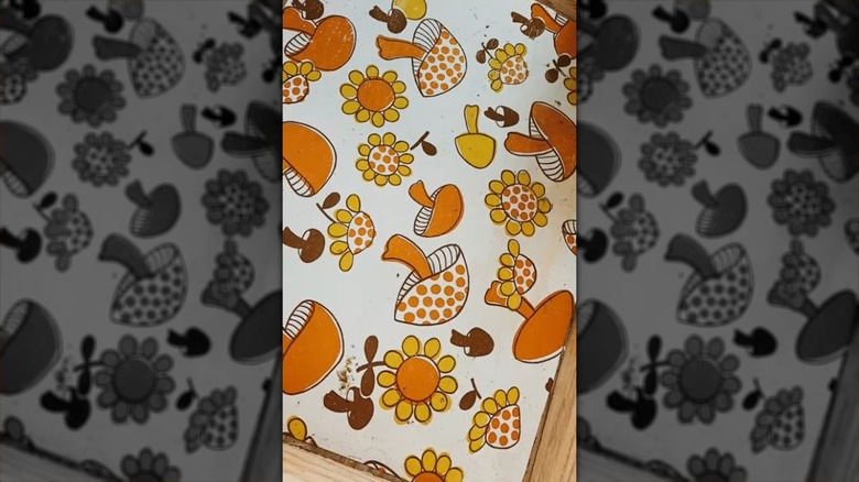 Mushroom-themed 1970s shelf liner in a drawer