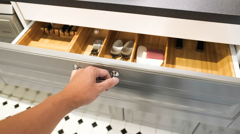 Hand opening kitchen drawer