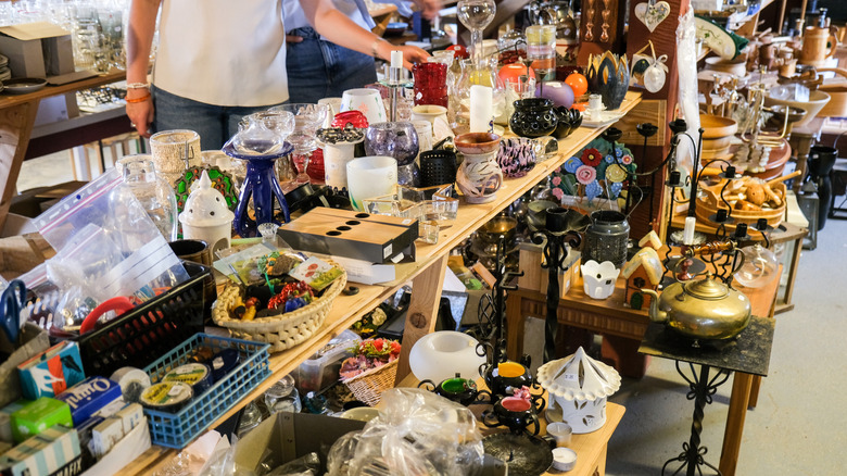 person browsing thrift store table