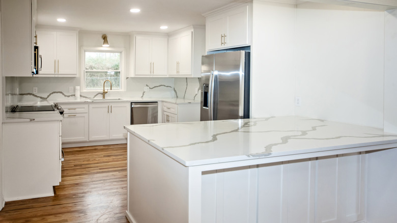 White countertops and all-white kitchen