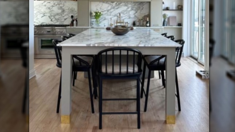 homeowner's remodeled kitchen with white cast refinished red oak floors