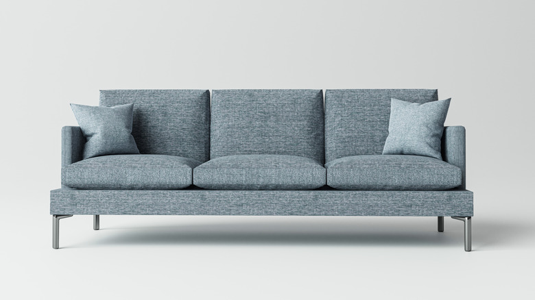 blue marle couch with pillows
