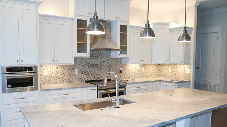 new white and stainless steel kitchen