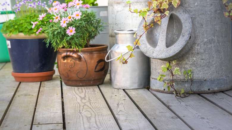 two pots next to each other on patio