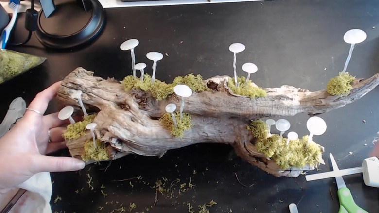DIY hot glue mushroom lights on a log
