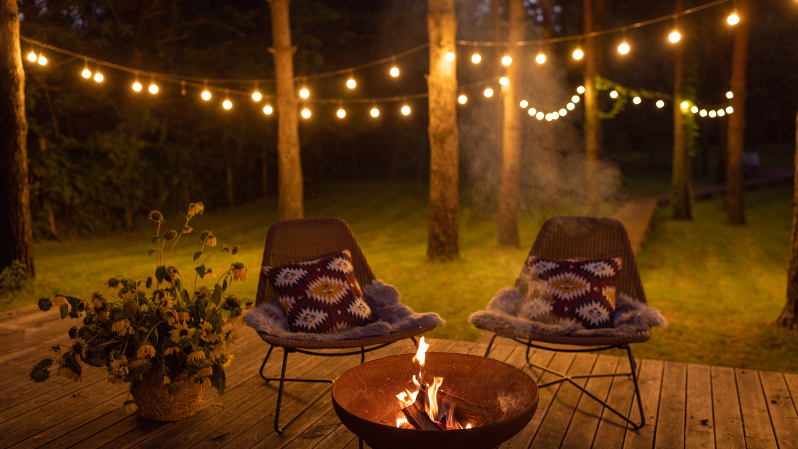 These DIY String Light Poles Will Brighten Up Any Patio