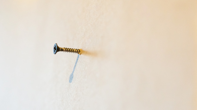 Small holes in wall