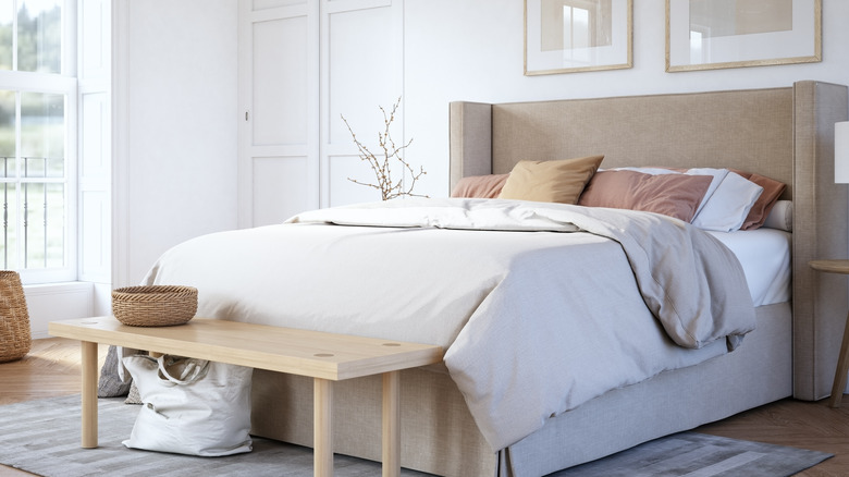 Bedroom with neutral sheets