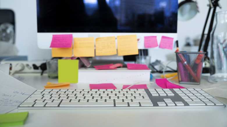 desk cluttered with stationery