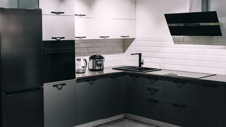 Kitchen with black stainless steel appliances