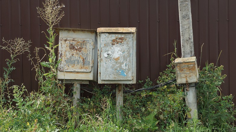Old ugly rusted utility boxes