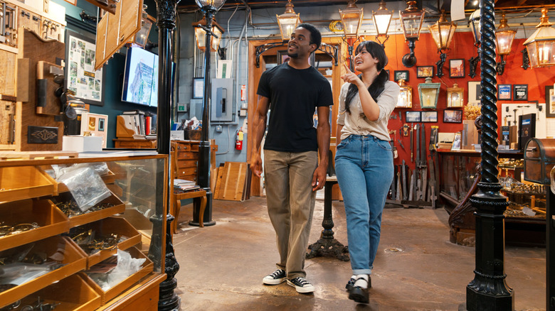 A couple shopping in an antique shop