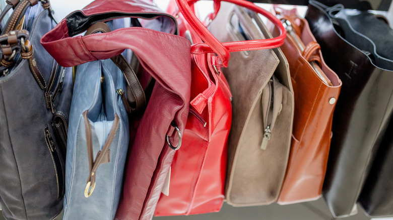 Handbags on a closet shelf