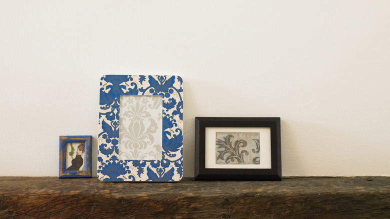 Old picture frames on desk