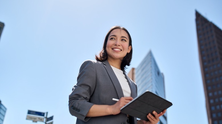Woman looking happy doing business 