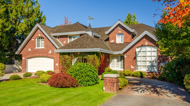 Signing papers to purchase home