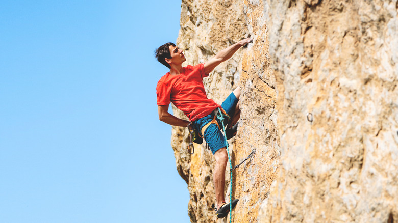 person rock-climbing
