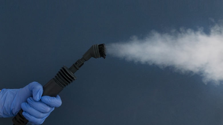 steam cleaner blue background