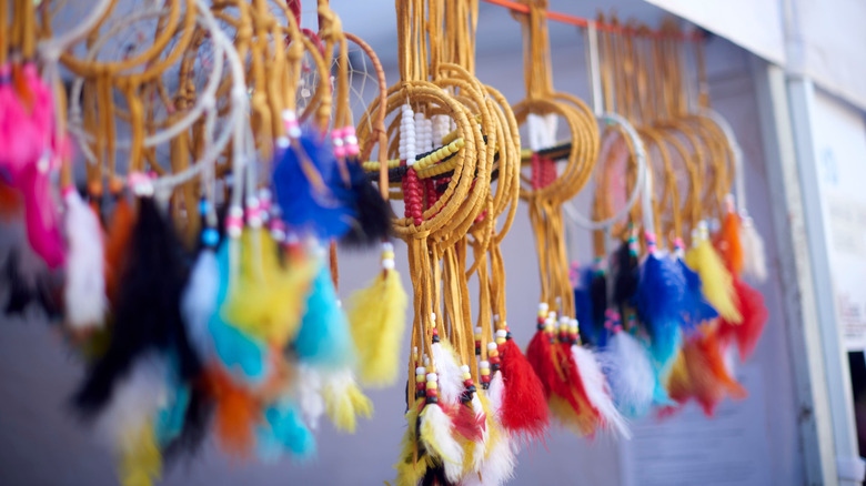 Colorful dreamcatchers hanging from the ceiling