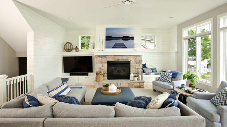 Artwork above fireplace that matches accent colors in the room
