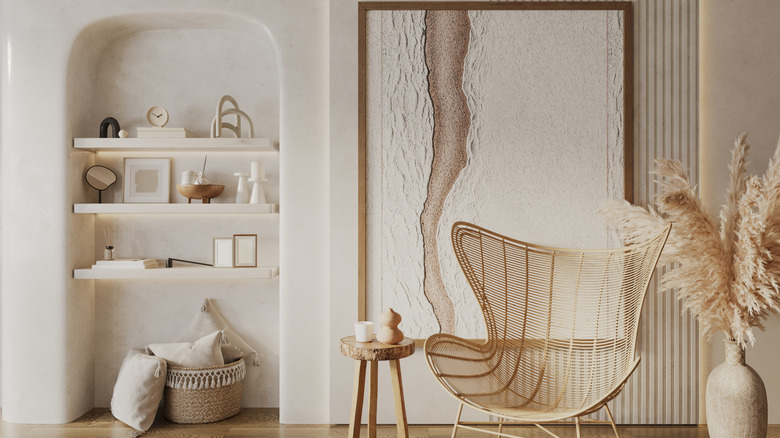 Bohemian style living room interior, arched built-in cove with shelves.