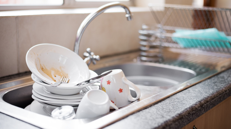 dirty dishes in sink