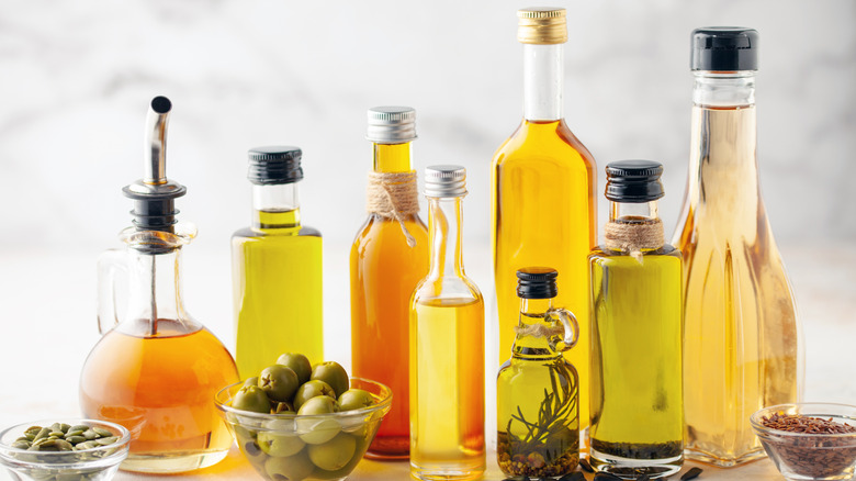 Olive oil and various types of oils in bottles