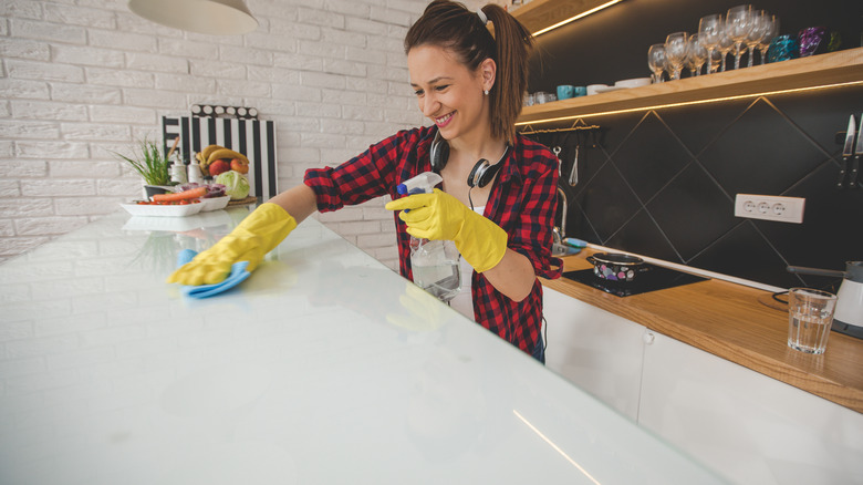 Woman cleaning counters