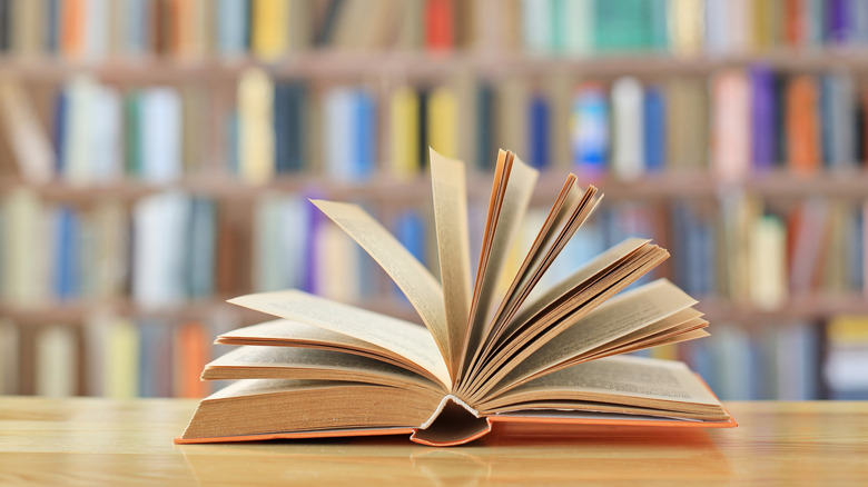 book laying open on library table
