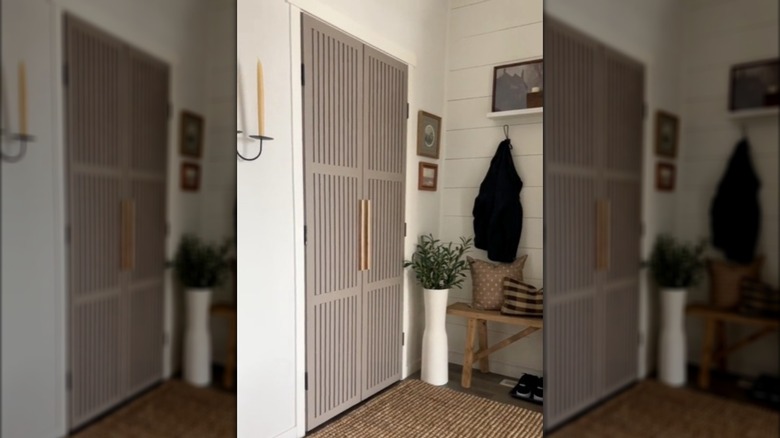 Taupe front door with slat detailing