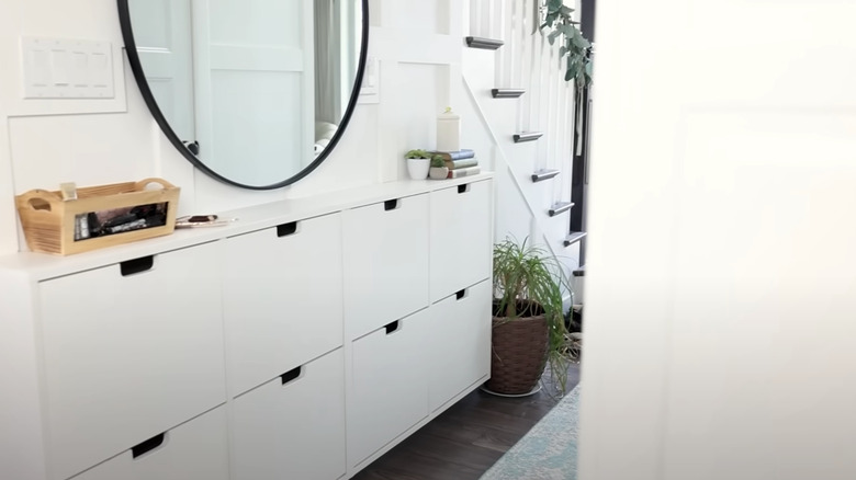 custom wall-mounted STÄLL shoe cabinets in white home