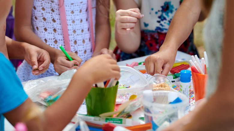 Kids at a crafting table
