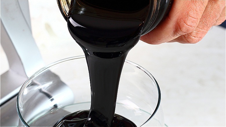 Pouring molasses into bowl