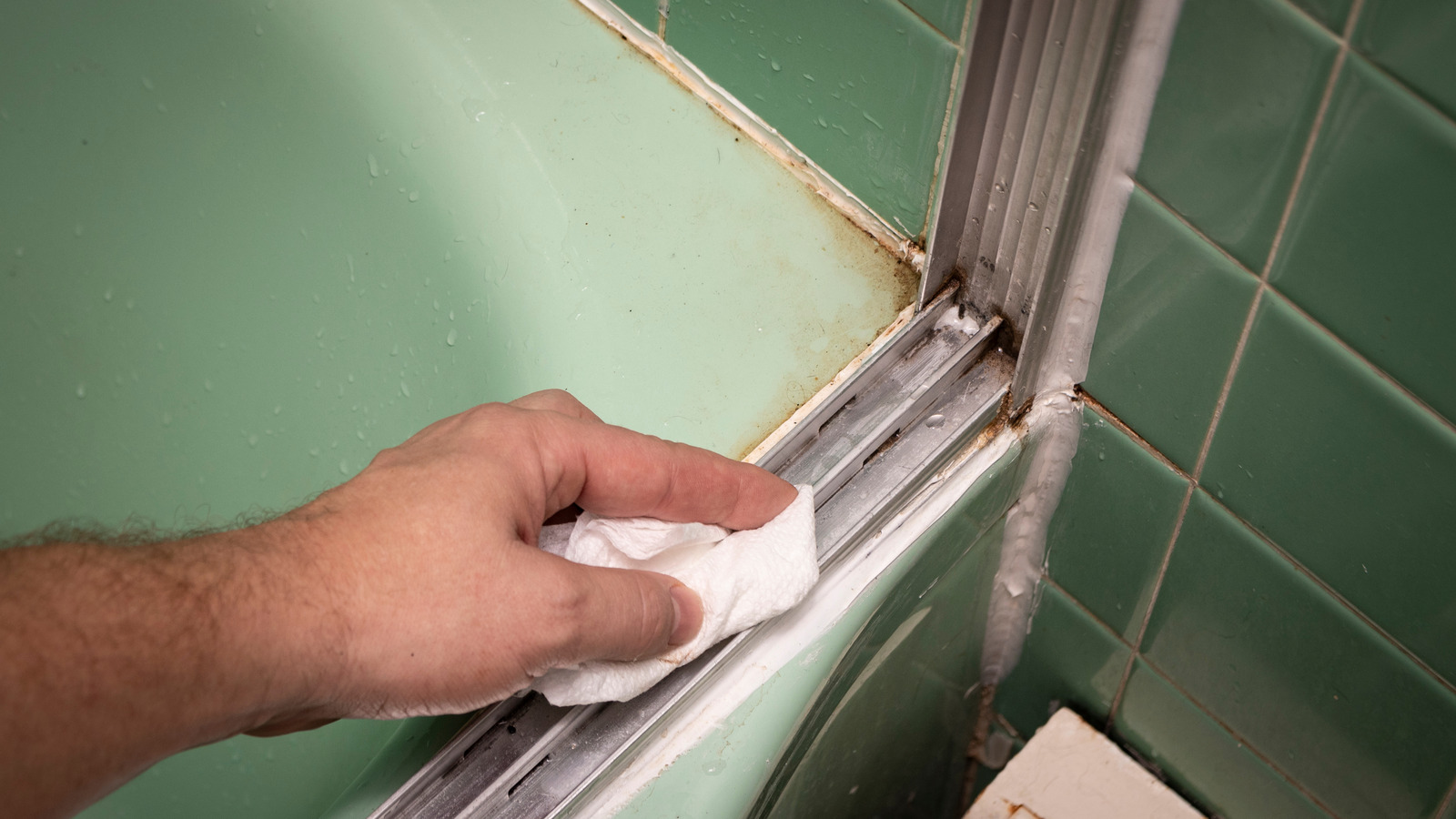 This Common Ingredient Will Leave Your Grimy Shower Door Tracks Shining