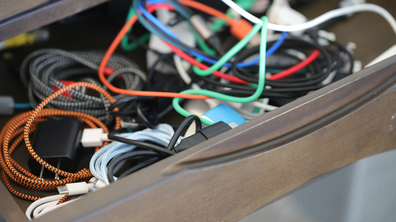 Multiple electronic device cords in a drawer