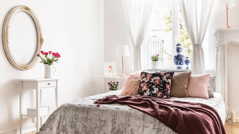 bedroom with blush accents