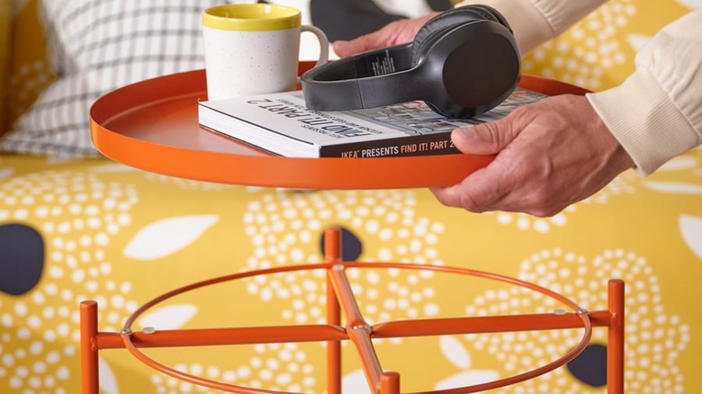 Orange IKEA table with removable tray top