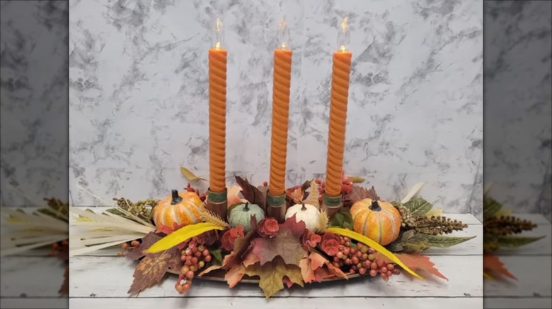 Centerpiece made with medicine bottle candleholders