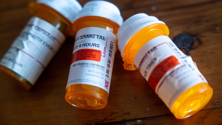 Three prescription medicine bottles