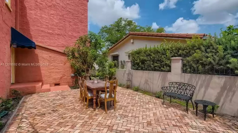 courtyard with brick flooring