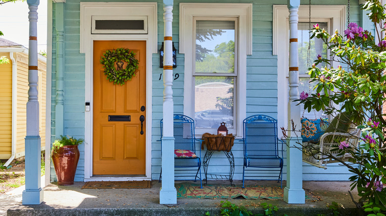 Front porch with wreath and planter decor