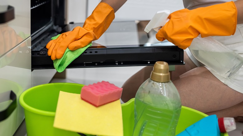woman has cleaned oven thoroughly