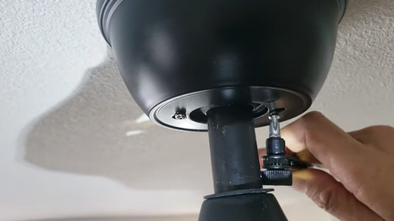 Person using Pittsburgh Ratcheting Right Angle Multi-Bit Screwdriver