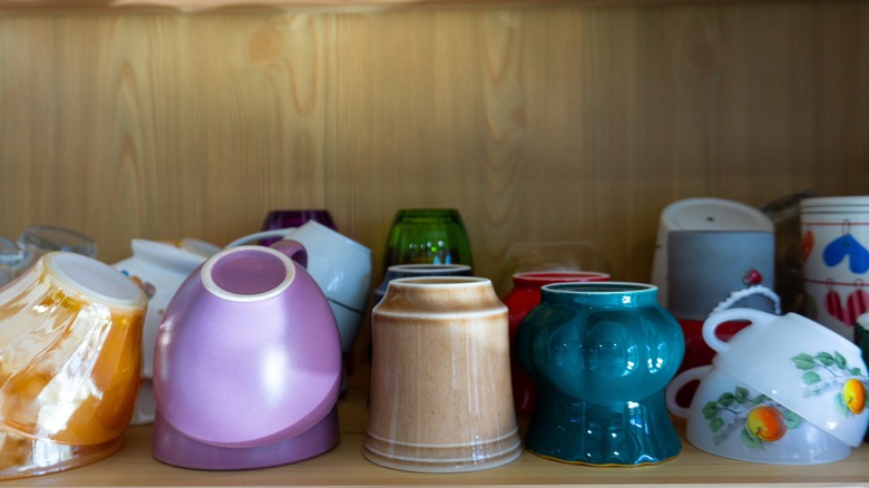 coffee mugs in cabinet
